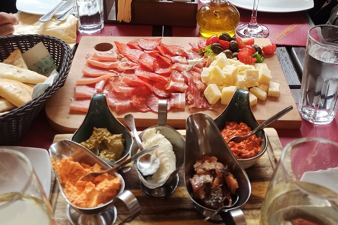 3 Hour Kotor Food Tour - Rick Steves' Recommended - The farmers market: prosciutto, cheese, olives, and rakija