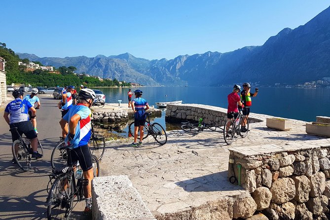 Bike tour - Kotor Bay circle and visit Our Lady of the Rock - Crossing the bay on the Kamenari ferry