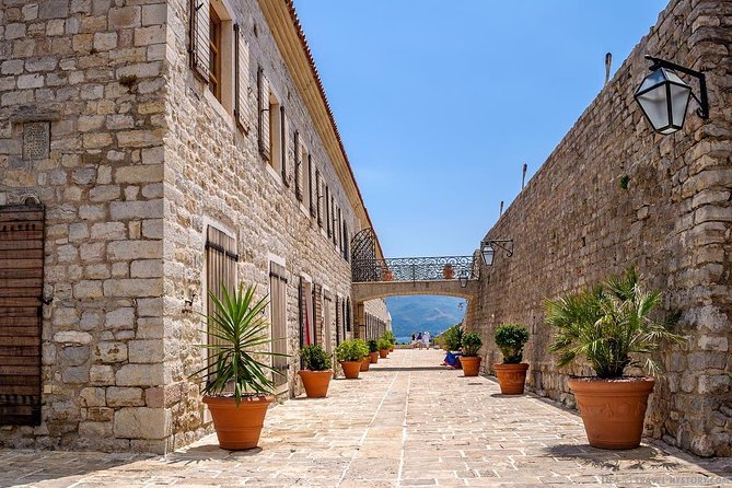 Budva City Tour - Walking beside the sunny marina