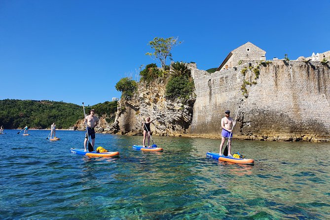 Budva: Kayak & SUP Rental - Following the coast toward bays and caves