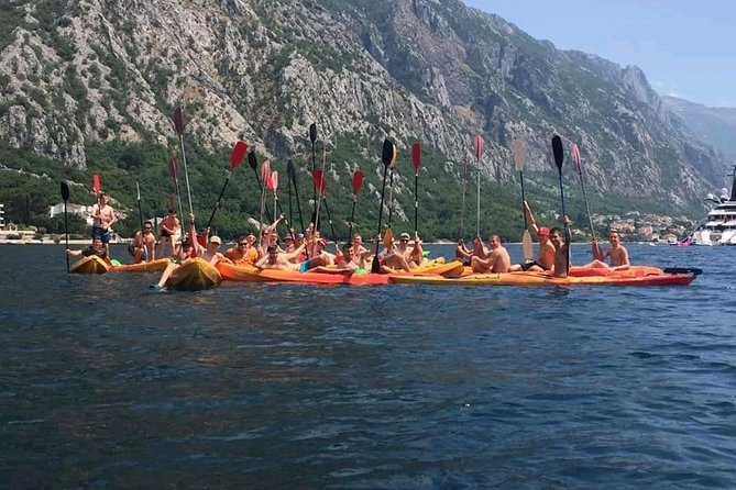Kayak active tour - Swimming in clear bay water