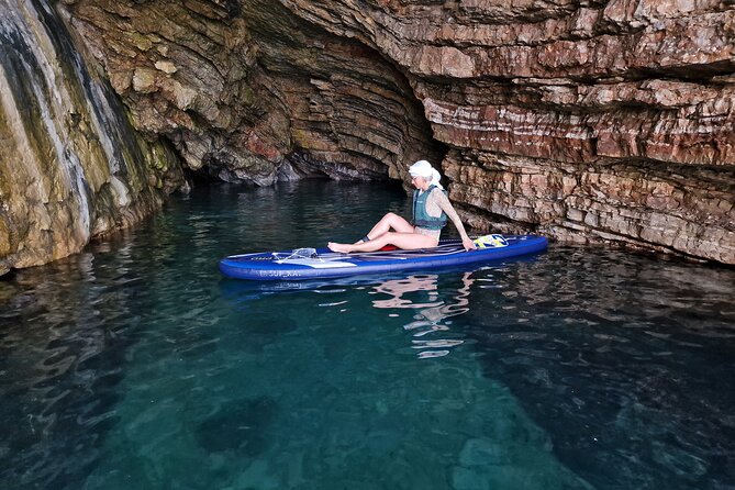 Small group kayaking tour from Budva to Sveti Nikola island caves - Paddling past Zavala toward Sveti Nikola